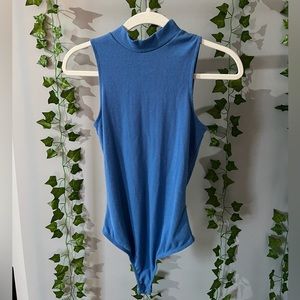 blue body suit with back cut out